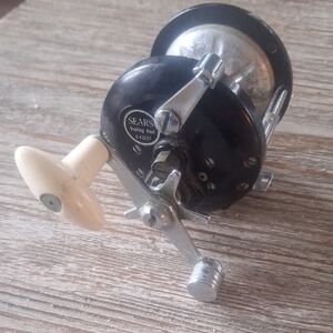 Vintage Sears Black and Silver Fishing Reel